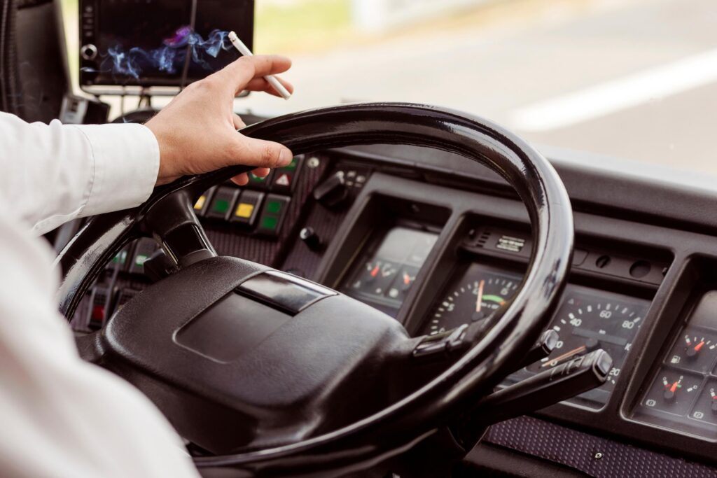Pennsylvania truck driver distracted by smoking, a common cognitive and manual distraction in commercial vehicle accidents.