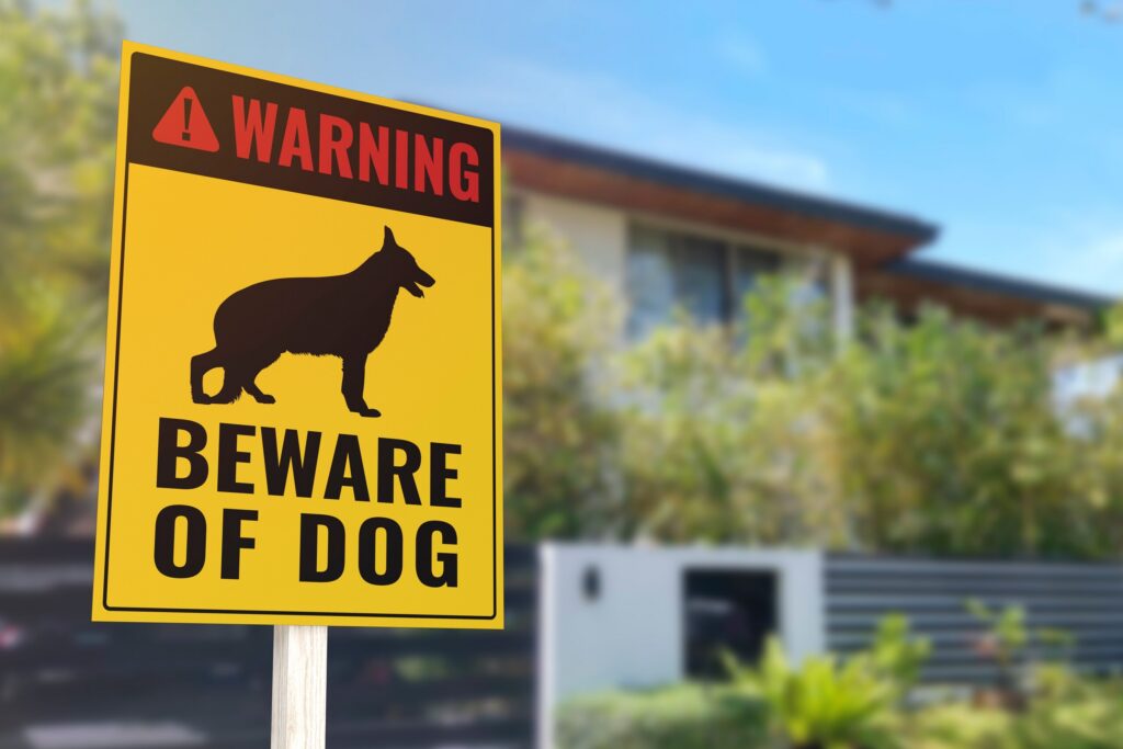 Beware of Dog warning sign on a Philadelphia property, relevant to proving owner knowledge of dangerous behavior.